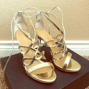 Beautiful gold brand new strapy high heel sandals